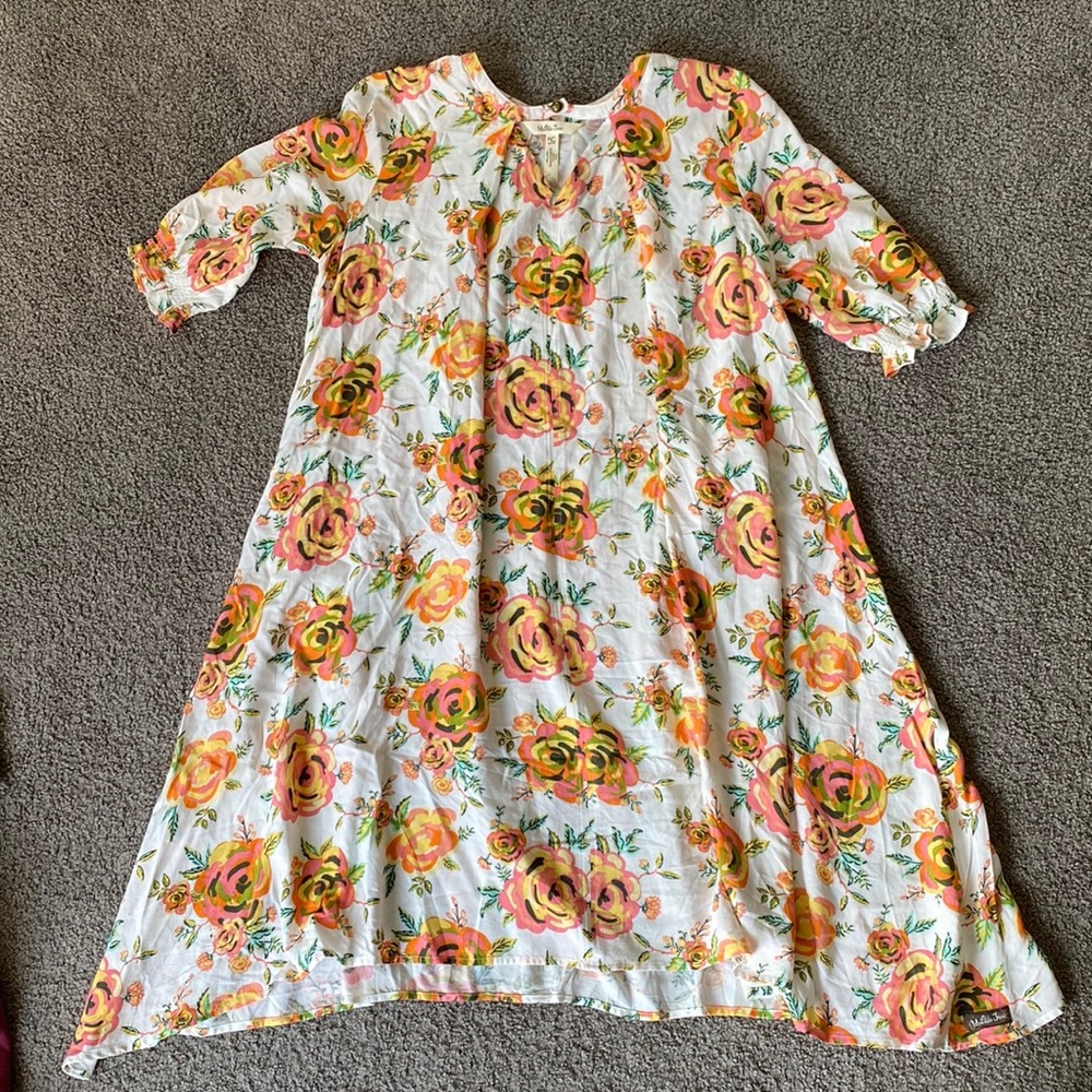 Matilda Jane Women’s short sleeved swing / trapeze dress with asymmetrical hem.